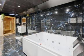 Love Room - Suite avec jacuzzi et sauna privatif